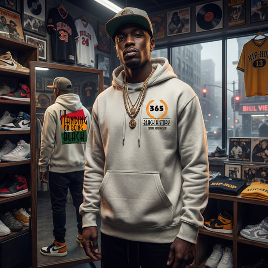 Man wearing a hoodie with a visible brand logo in a store setting