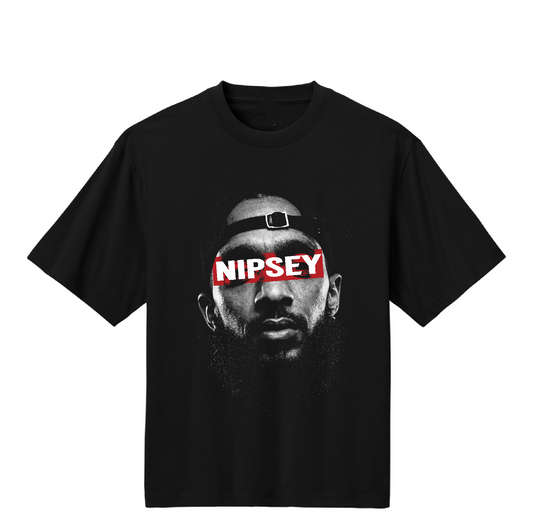 Black t-shirt with a graphic of a person's face and 'Nipsey' text on a white background